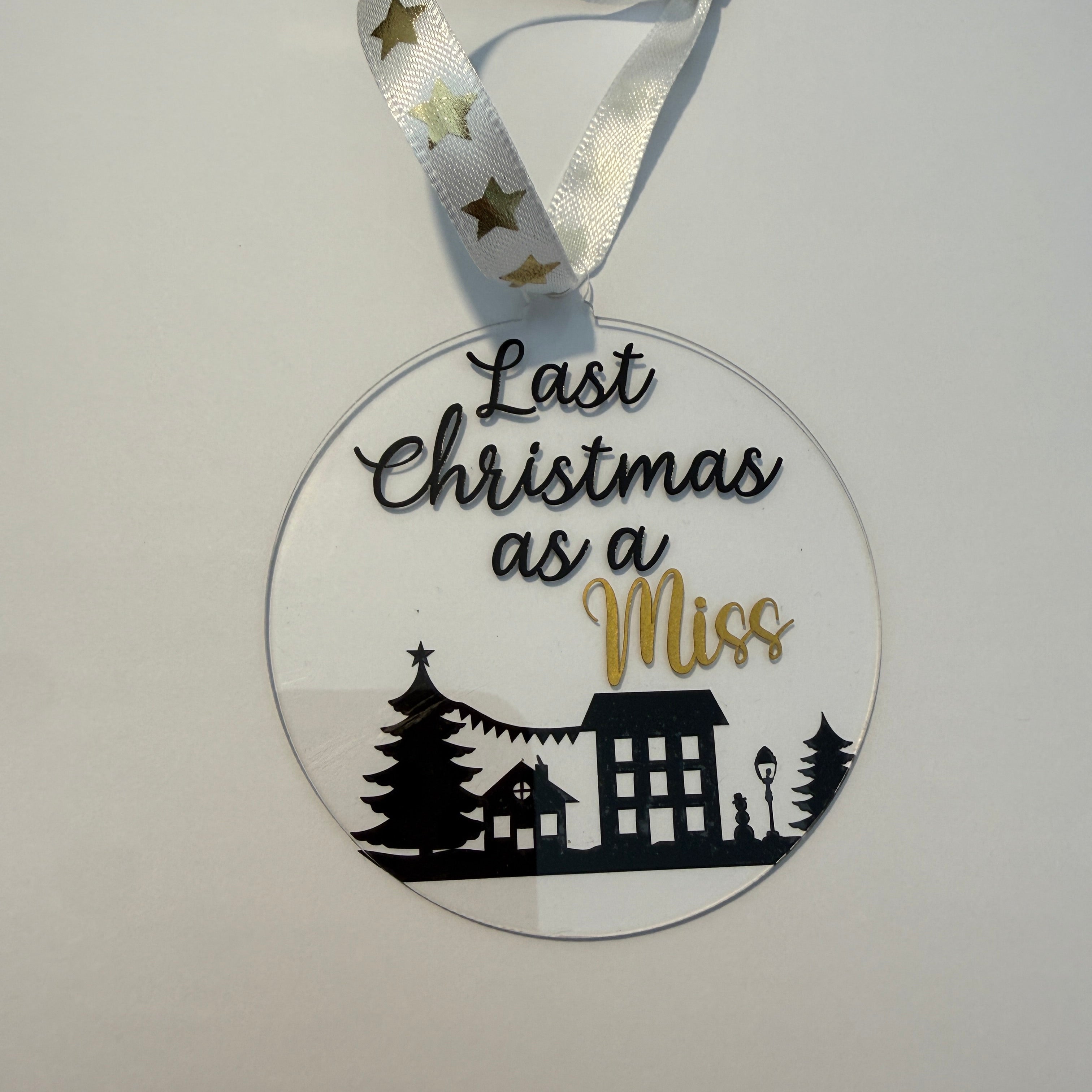 Last Christmas as a Miss. A festive keepsake and thoughtful gift for a bride-to-be. 8cm clear acrylic bauble.