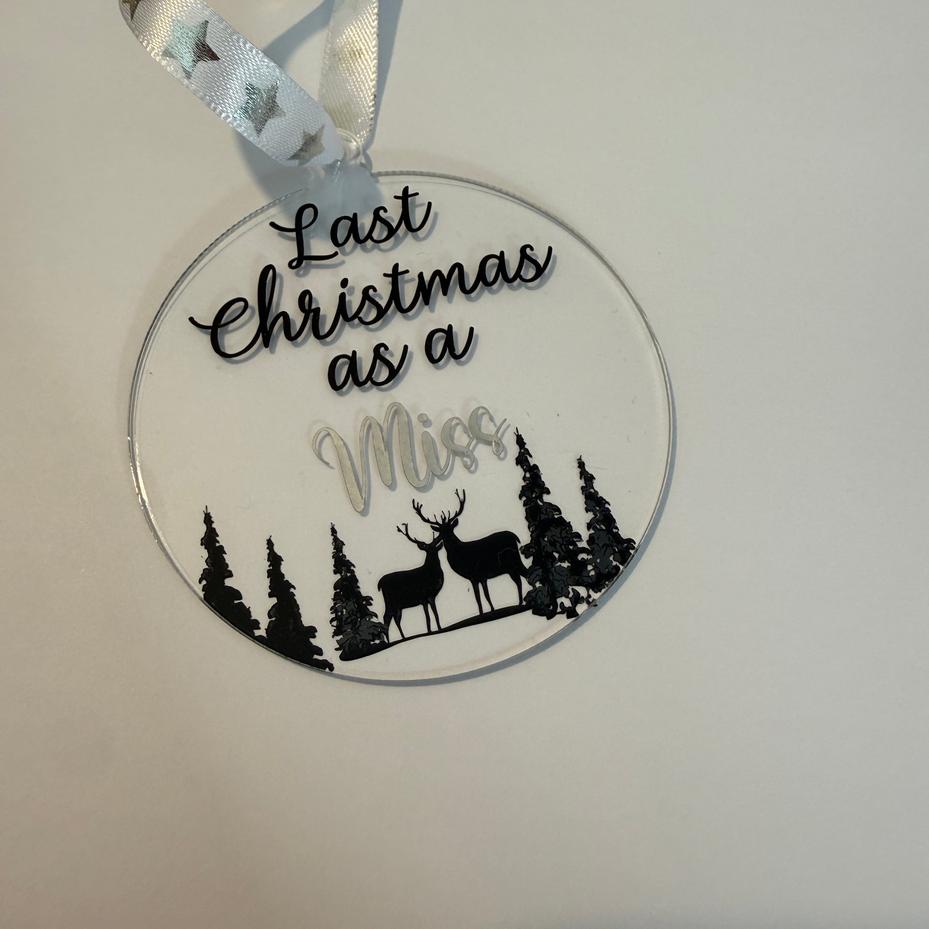 Last Christmas as a Miss. A festive keepsake and thoughtful gift for a bride-to-be. 8cm clear acrylic bauble.