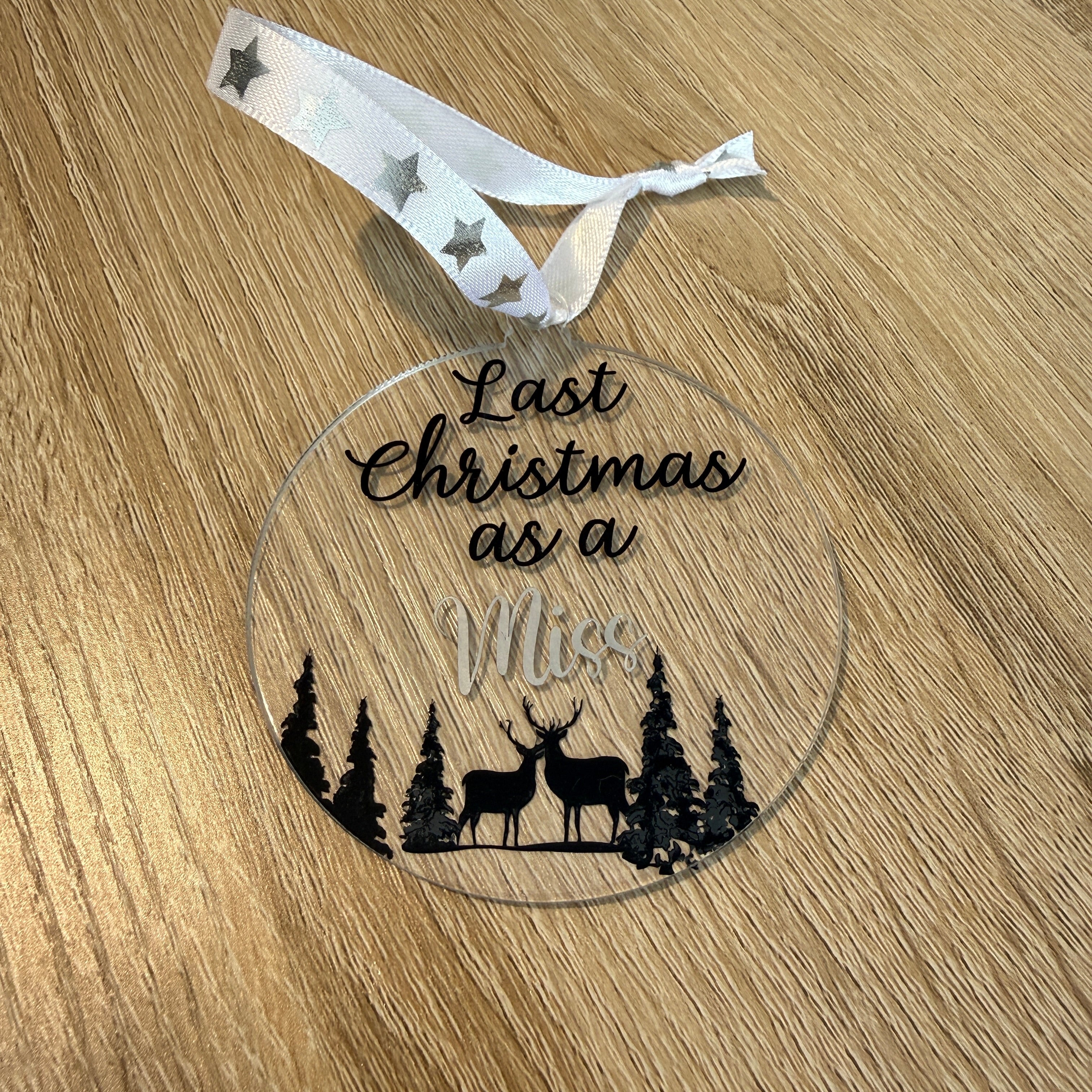Last Christmas as a Miss. A festive keepsake and thoughtful gift for a bride-to-be. 8cm clear acrylic bauble.