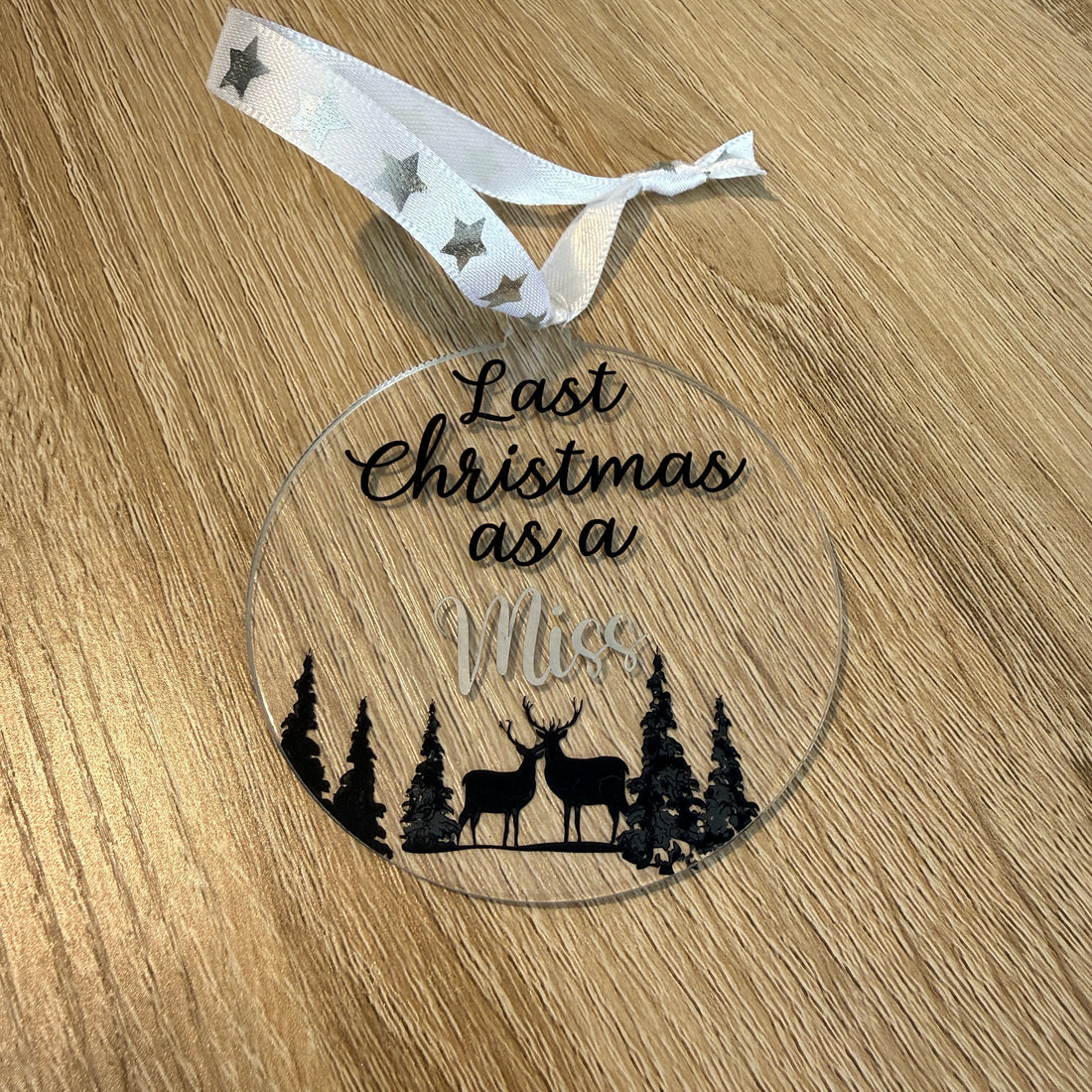 Last Christmas as a Miss. A festive keepsake and thoughtful gift for a bride-to-be. 8cm clear acrylic bauble.