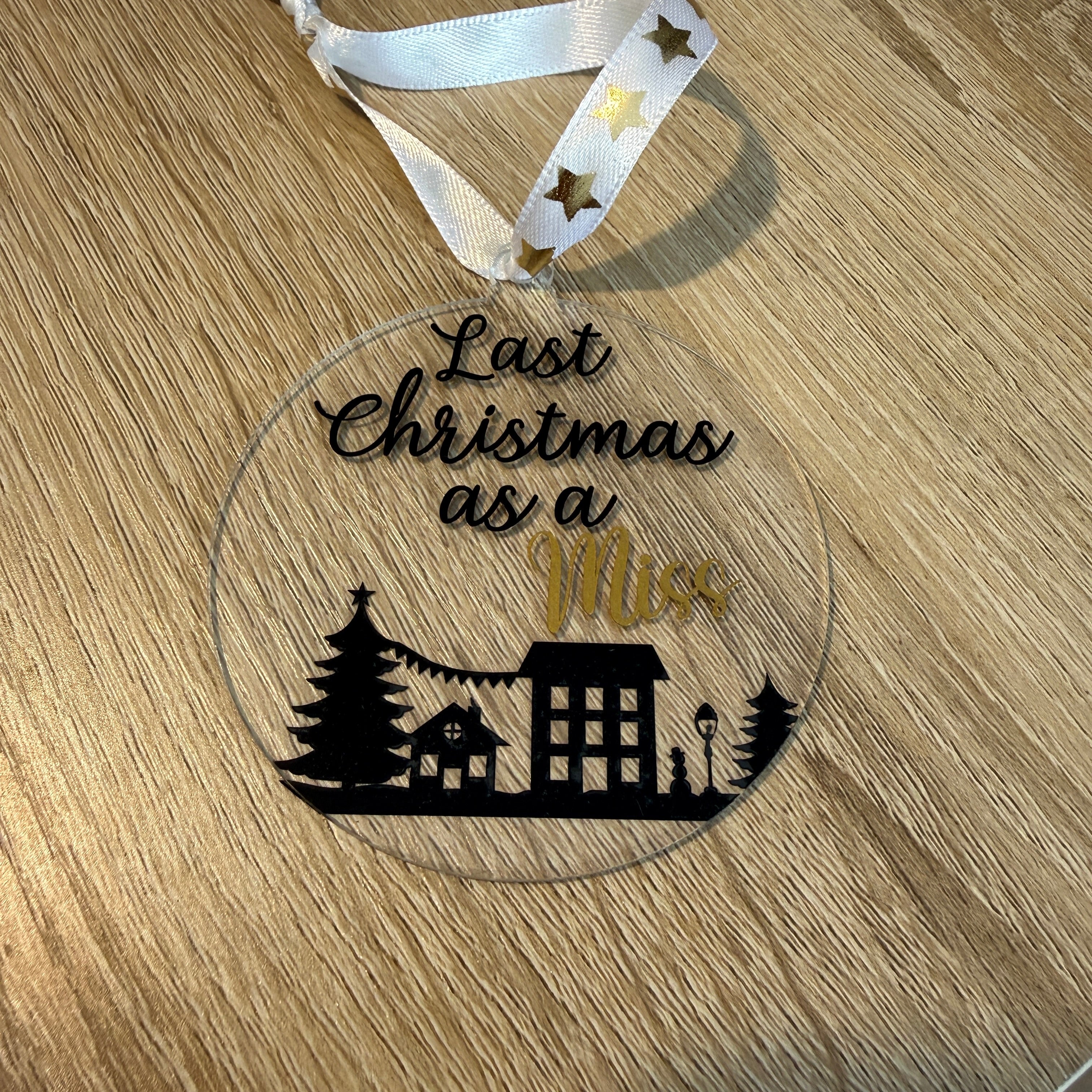 Last Christmas as a Miss. A festive keepsake and thoughtful gift for a bride-to-be. 8cm clear acrylic bauble.