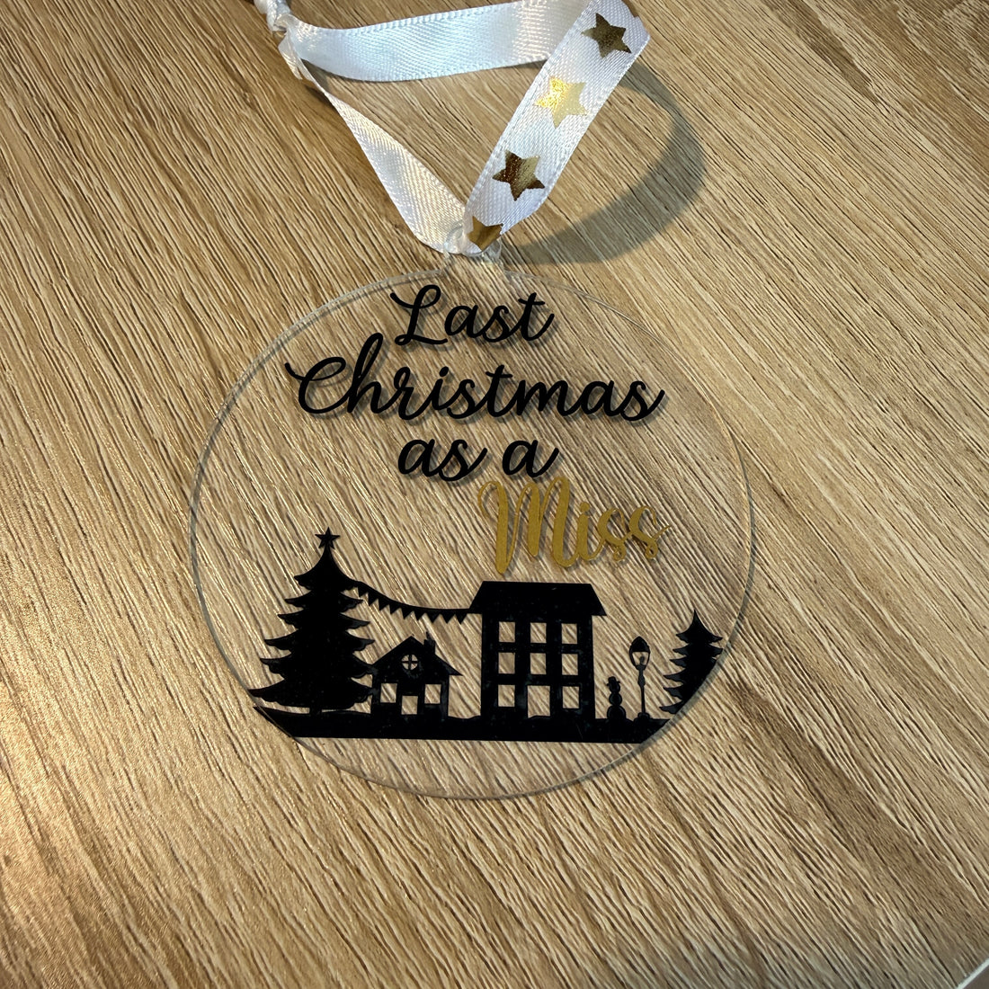 Last Christmas as a Miss. A festive keepsake and thoughtful gift for a bride-to-be. 8cm clear acrylic bauble.
